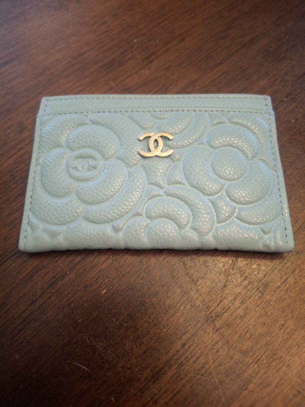 CHANEL Light Blue Camellia Embossed Card Case with Gold CC
